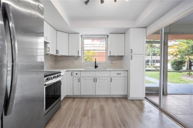 Beautifully renovated 1st-floor condo in the heart of Hallandale