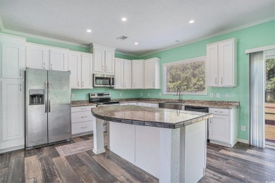 No HOA! This 3-bedroom, 2-bath home sits on over an acre of land