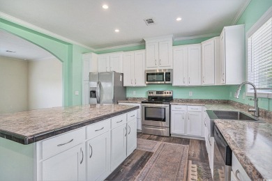 No HOA! This 3-bedroom, 2-bath home sits on over an acre of land