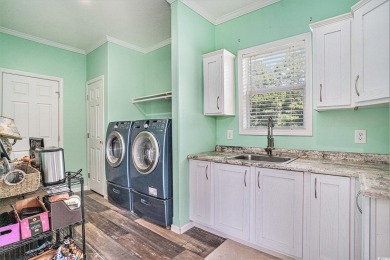 No HOA! This 3-bedroom, 2-bath home sits on over an acre of land