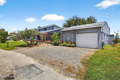 WATERFRONT and priced to sell! This beautiful home is sure to