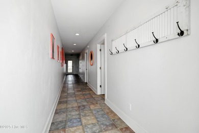 Welcome to a unique oceanfront treasure with endless opportunity