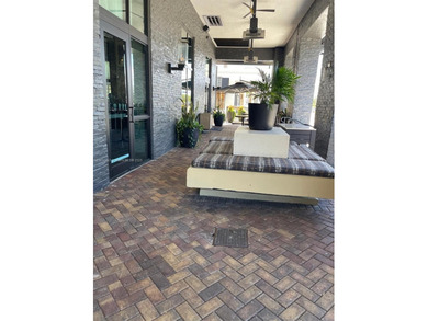 This spacious residence offers an open-concept living and dining