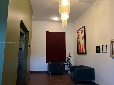 This spacious residence offers an open-concept living and dining