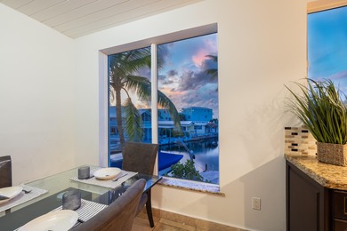 GOLDEN HOUR LIVING - This three level home offers four bedrooms