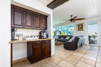 GOLDEN HOUR LIVING - This three level home offers four bedrooms