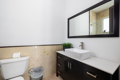 GOLDEN HOUR LIVING - This three level home offers four bedrooms