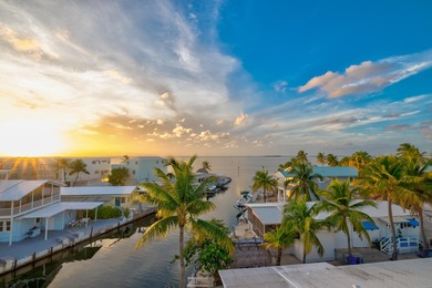 GOLDEN HOUR LIVING - This three level home offers four bedrooms