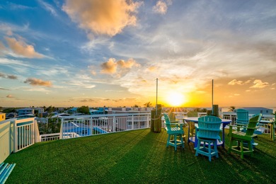 GOLDEN HOUR LIVING - This three level home offers four bedrooms