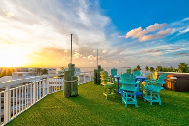 GOLDEN HOUR LIVING - This three level home offers four bedrooms