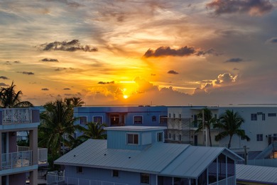 GOLDEN HOUR LIVING - This three level home offers four bedrooms