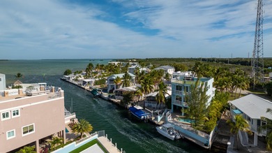 GOLDEN HOUR LIVING - This three level home offers four bedrooms