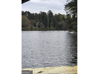 WOW! WHAT A RARE FIND IN A LAKE COMMUNITY! THIS HOME FEATURES A