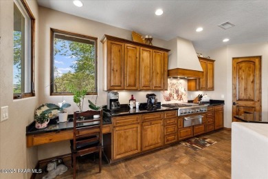 Tucked at the end of a private cul-de-sac, this exquisite estate