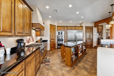 Tucked at the end of a private cul-de-sac, this exquisite estate