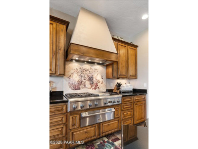 Tucked at the end of a private cul-de-sac, this exquisite estate