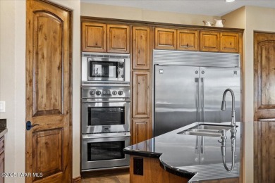 Tucked at the end of a private cul-de-sac, this exquisite estate