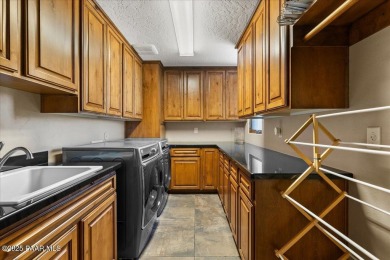 Tucked at the end of a private cul-de-sac, this exquisite estate