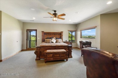 Tucked at the end of a private cul-de-sac, this exquisite estate