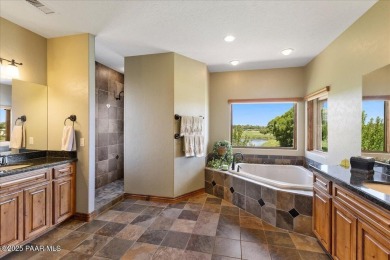 Tucked at the end of a private cul-de-sac, this exquisite estate