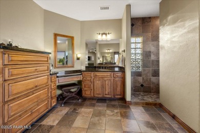 Tucked at the end of a private cul-de-sac, this exquisite estate