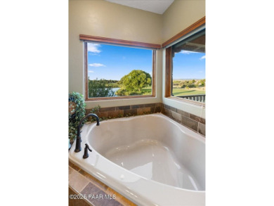 Tucked at the end of a private cul-de-sac, this exquisite estate