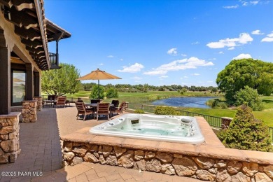 Tucked at the end of a private cul-de-sac, this exquisite estate