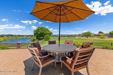 Tucked at the end of a private cul-de-sac, this exquisite estate