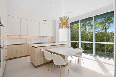 Experience luxury coastal living in this fully renovated 3-story