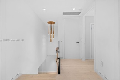 Experience luxury coastal living in this fully renovated 3-story