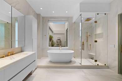 Experience luxury coastal living in this fully renovated 3-story