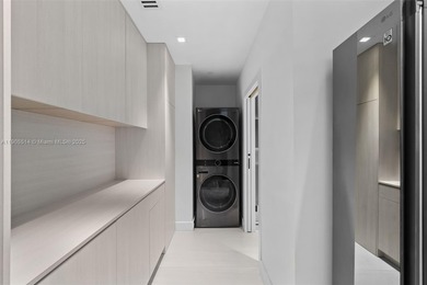 Experience luxury coastal living in this fully renovated 3-story