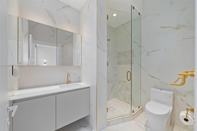 Experience luxury coastal living in this fully renovated 3-story