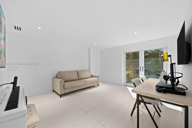 Experience luxury coastal living in this fully renovated 3-story