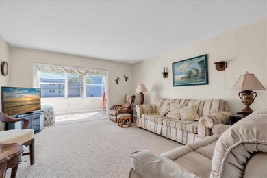 Welcome to this Fee Simple, classic waterfront, beach-living