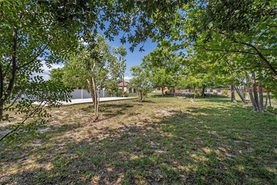 LOCATION - LOCATION - LOCATION!! DOUBLE LOT, POOL HOME! This