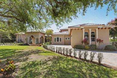 Welcome to a modern Pinecrest masterpiece! This 9,912-sq-ft home