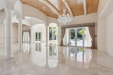 Welcome to a modern Pinecrest masterpiece! This 9,912-sq-ft home