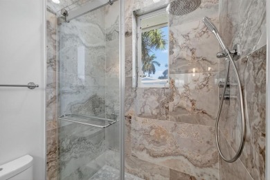 Newly Priced! Experience premier waterfront living in Seven