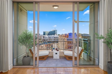 Experience luxury high-rise living at its finest in this