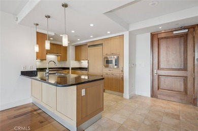 Experience luxury high-rise living at its finest in this