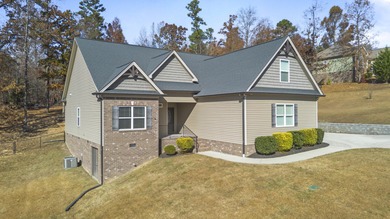 Welcome to 225 Brook Hollow Drive SE. Nestled in the serene and