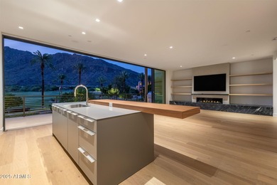 Experience the epitome of elegance and modern living in this