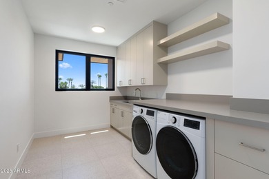 Experience the epitome of elegance and modern living in this