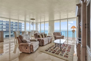 Rarely available direct ocean corner residence offering 3