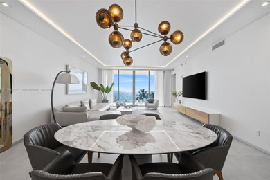 Experience refined oceanfront living in Residence 401 at the