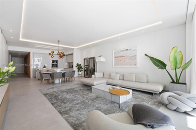 Experience refined oceanfront living in Residence 401 at the