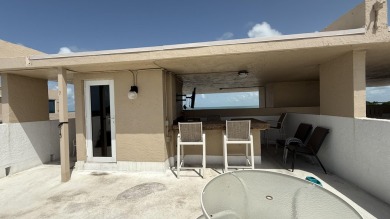 This stunning 3-bedroom, 2 bath, fully furnished penthouse