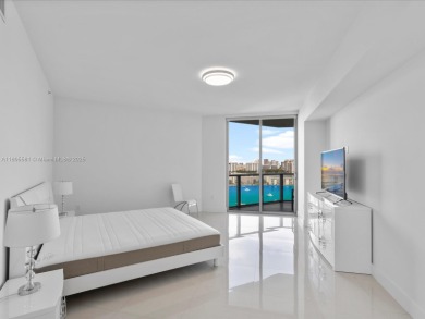 Discover waterfront luxury in this spacious 2-bedroom + den