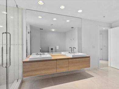 Discover waterfront luxury in this spacious 2-bedroom + den